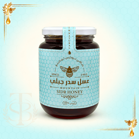 Pure Sidr honey pouring from a wooden dipper at Safi Brothers Trading shop